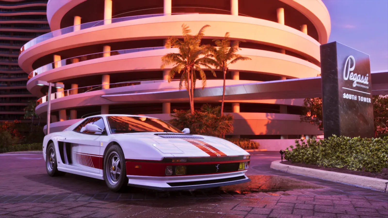 Deportivo blanco con franjas rojas aparcado al atardecer ante un edificio curvo de color rosa con el rótulo Pegassi Residences South Tower.
