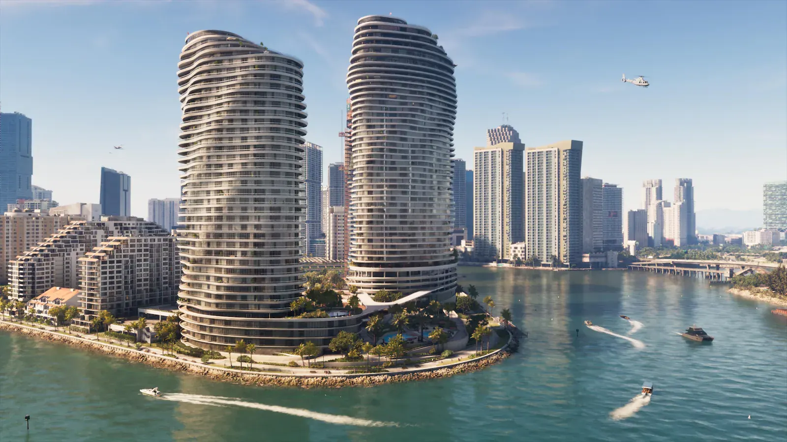 Dos torres de apartamentos de formas curvas sobre una punta de tierra rodeada de agua turquesa, con lanchas dejando estela, un helicóptero y el resto de la ciudad al fondo.